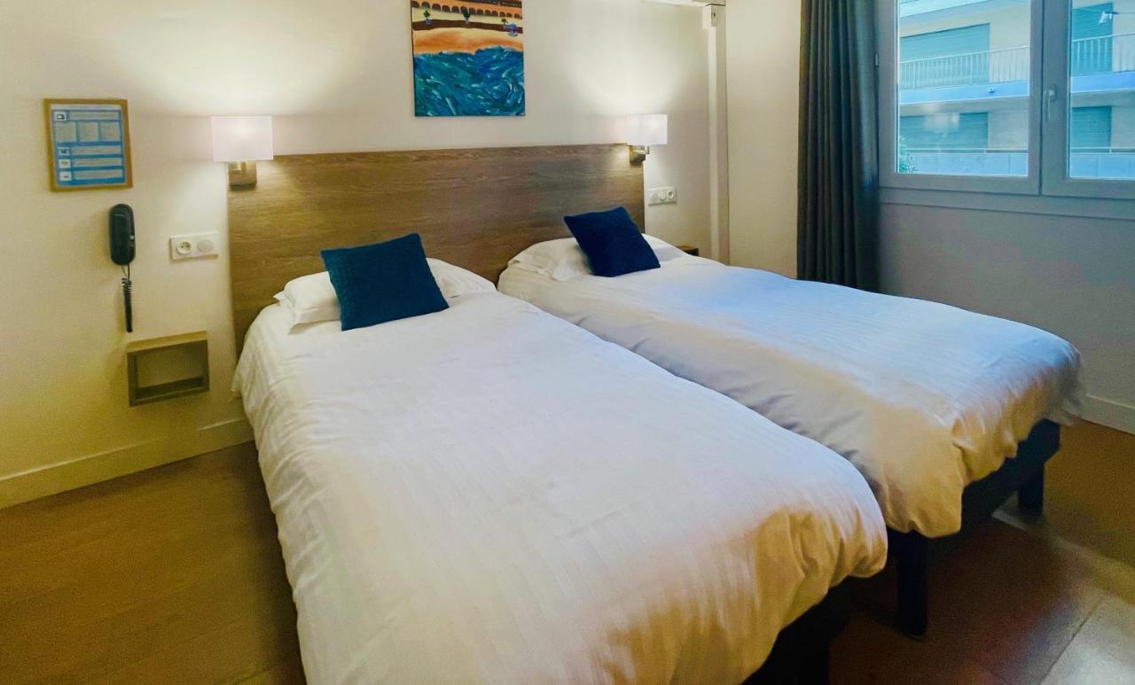 Hotel Courbet Juan-les-Pins Esterno foto