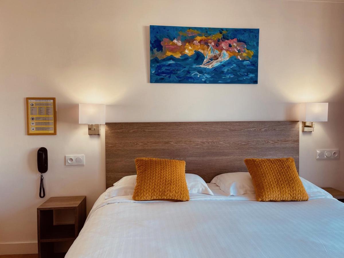 Hotel Courbet Juan-les-Pins Esterno foto