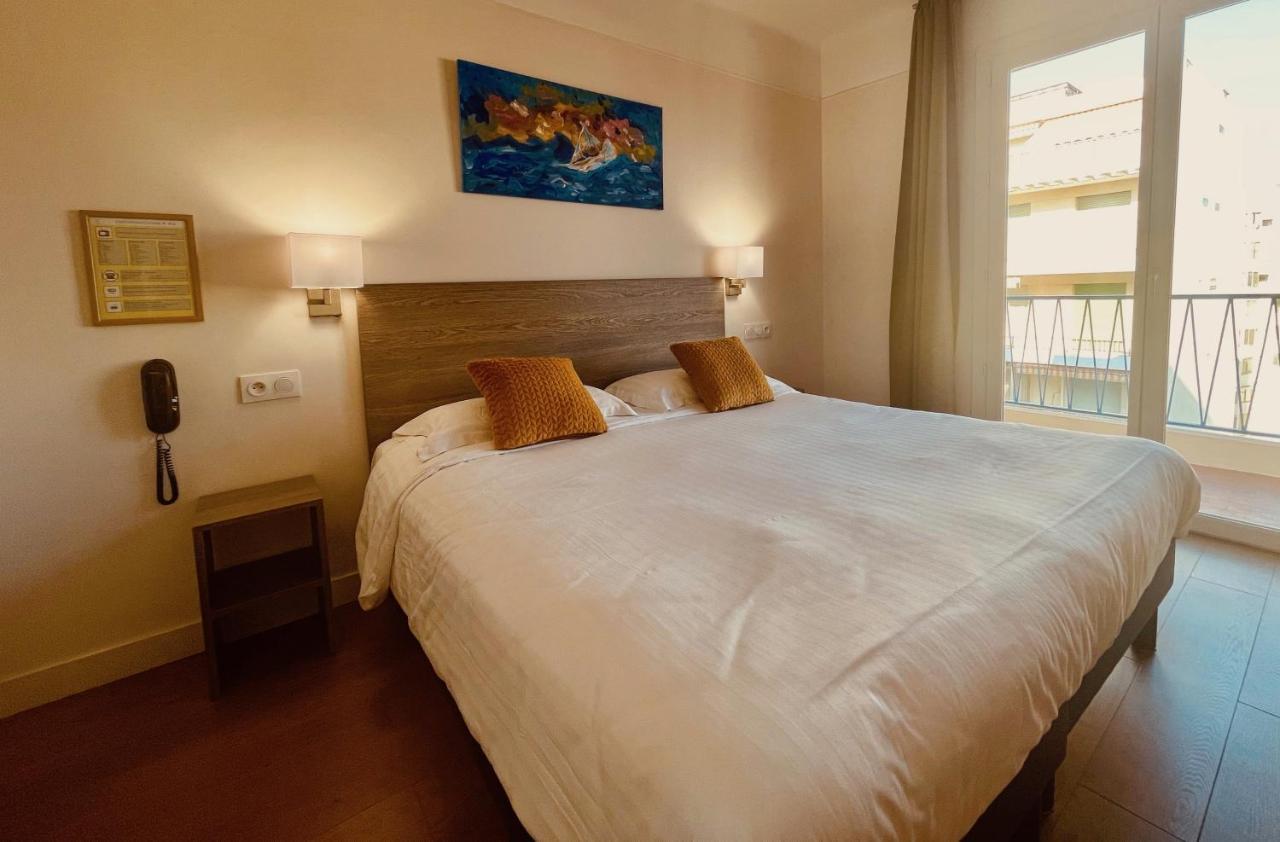 Hotel Courbet Juan-les-Pins Esterno foto