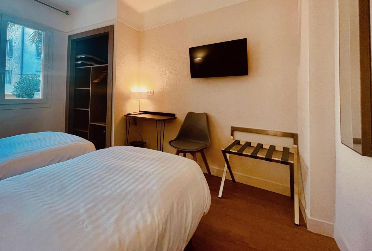 Hotel Courbet Juan-les-Pins Esterno foto