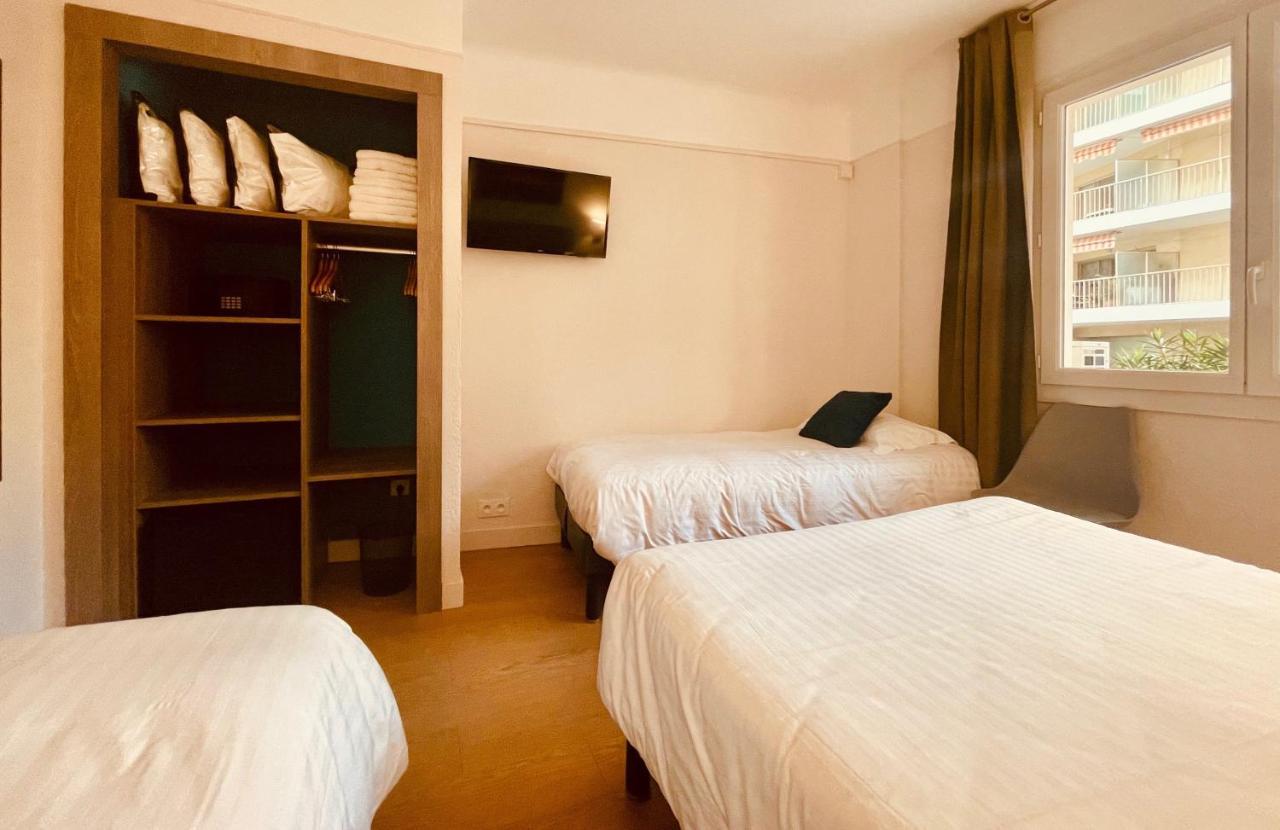 Hotel Courbet Juan-les-Pins Esterno foto