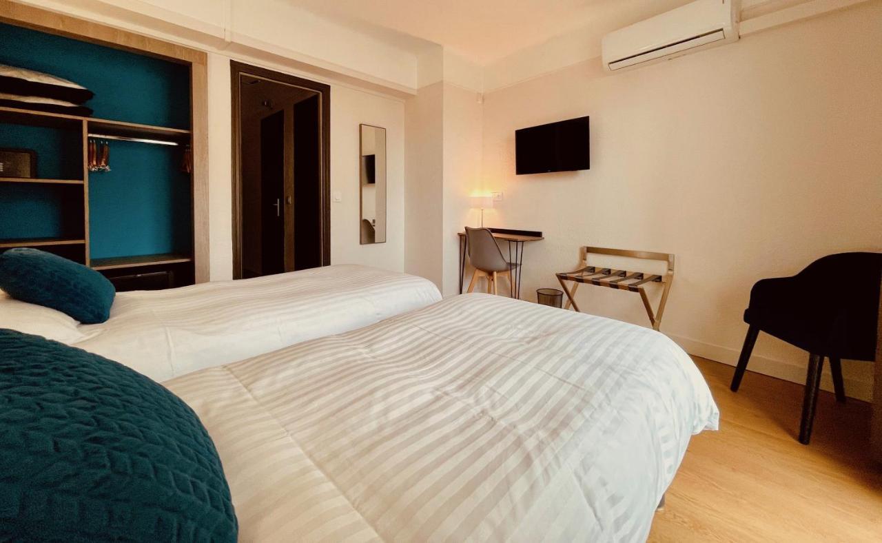 Hotel Courbet Juan-les-Pins Esterno foto