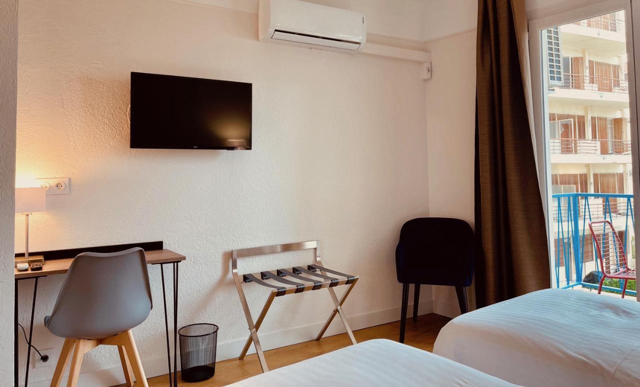 Hotel Courbet Juan-les-Pins Esterno foto