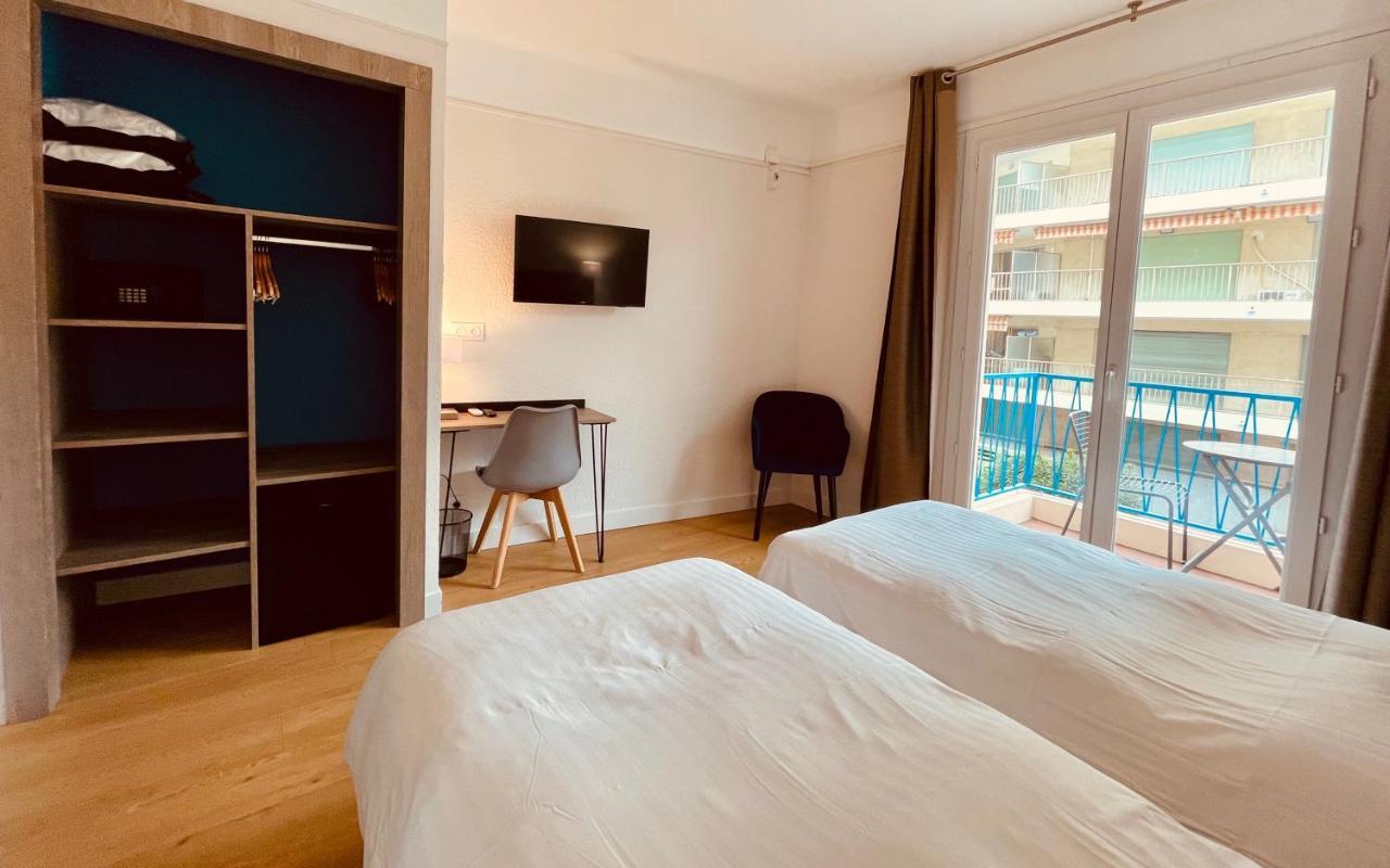 Hotel Courbet Juan-les-Pins Esterno foto