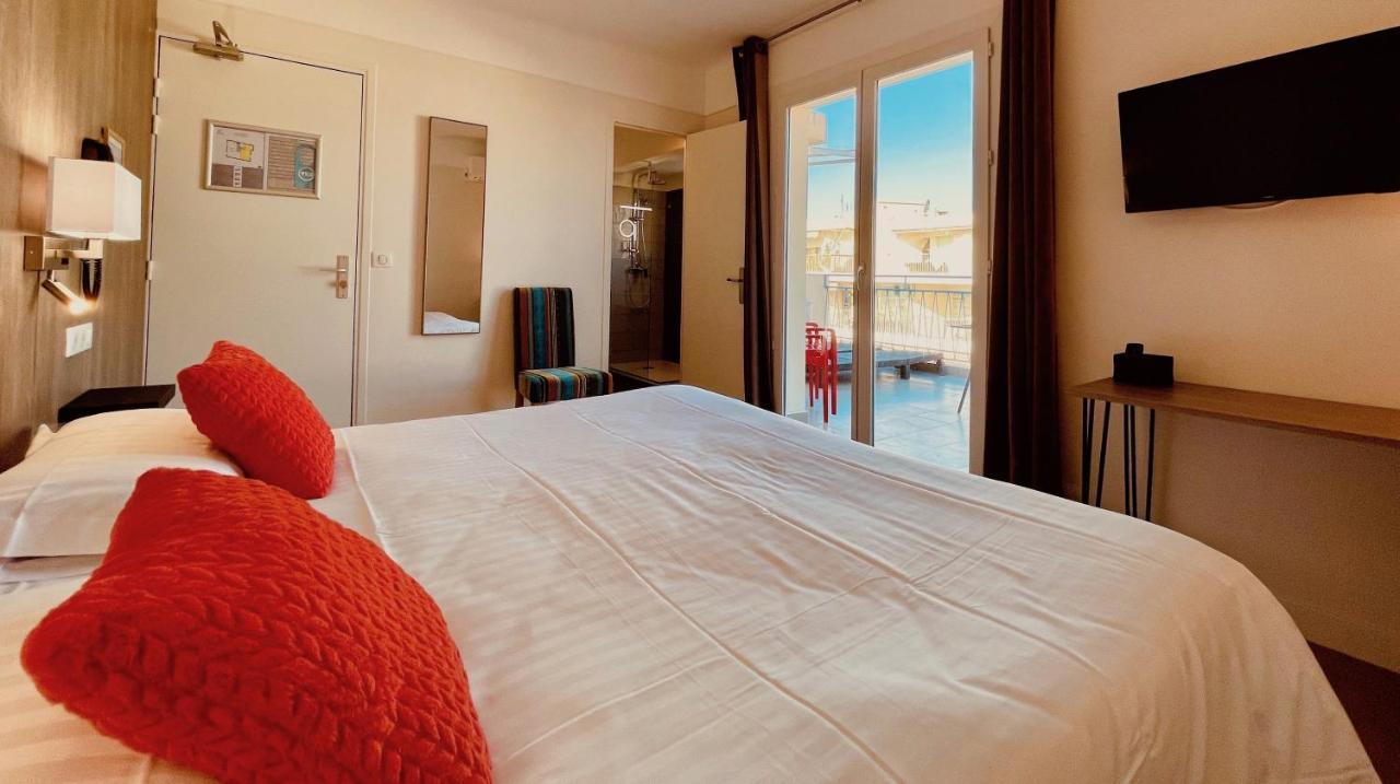 Hotel Courbet Juan-les-Pins Esterno foto